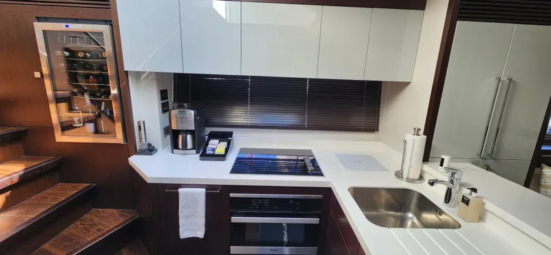 Slide: The Image of Modern kitchen in 2020 Sunseeker Predator 74 XPS yacht with sleek appliances. - 48