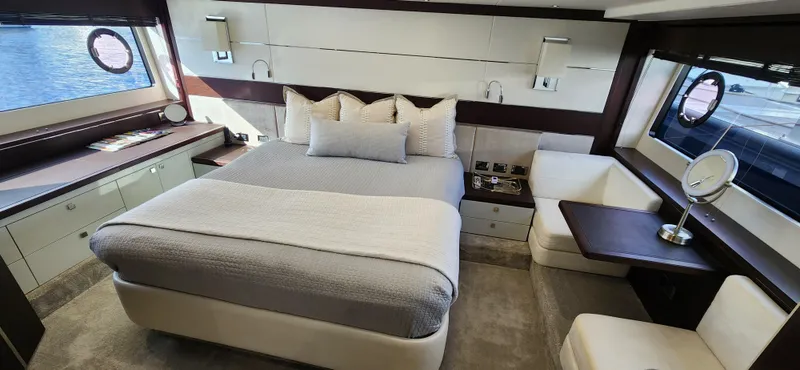 Slide: The Image of Luxurious bedroom interior of 2020 Sunseeker Predator 74 XPS yacht with modern furnishings. - 6