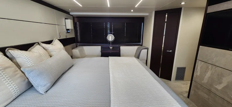 Slide: The Image of Luxurious bedroom interior of 2020 Sunseeker Predator 74 XPS yacht. - 8