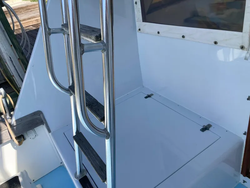 Slide: The Image of Stainless steel ladder on 1975 Custom 36 Matlack Tournament SF boat deck. - 18