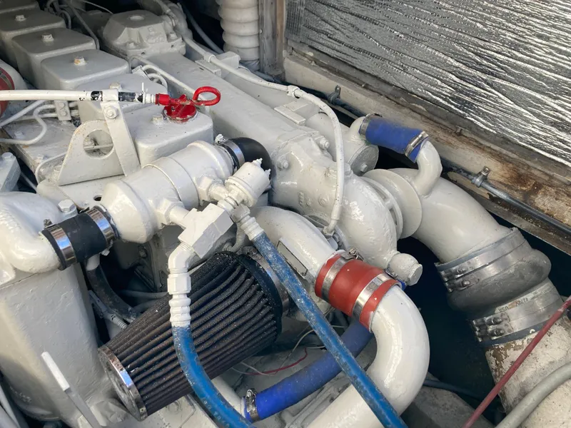 Slide: The Image of Engine compartment of a 1975 Custom 36 Matlack Tournament SF boat. - 23