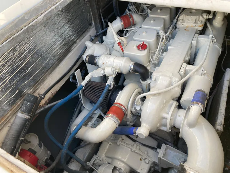 Slide: The Image of Engine compartment of a 1975 Custom 36 Matlack Tournament SF boat. - 24