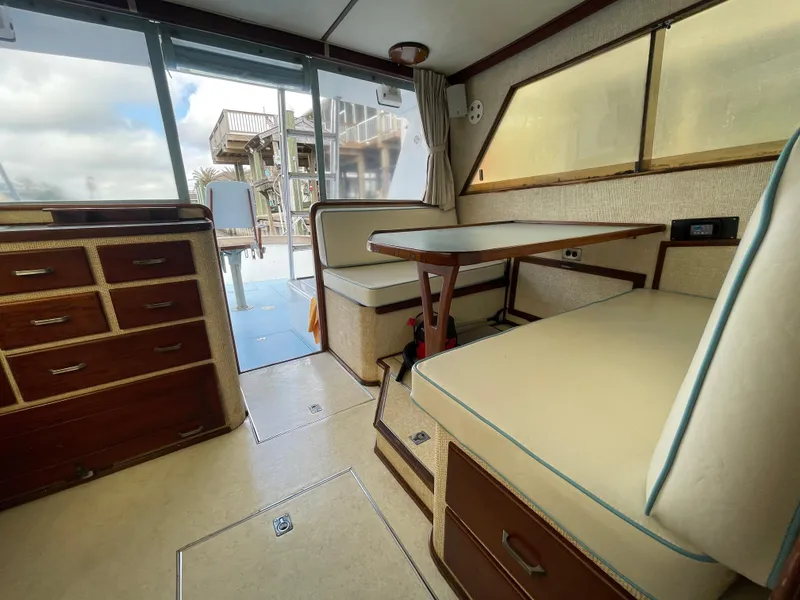 Slide: The Image of Interior of 1975 Custom 36 Matlack Tournament SF boat with seating and table. - 28
