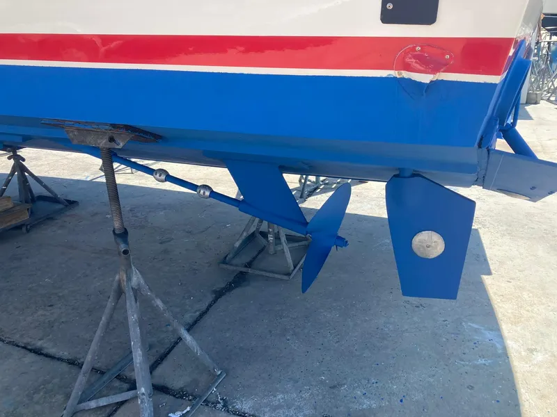 Slide: The Image of Close-up of the propeller and rudder of a 1975 Custom 36 Matlack Tournament SF boat. - 7