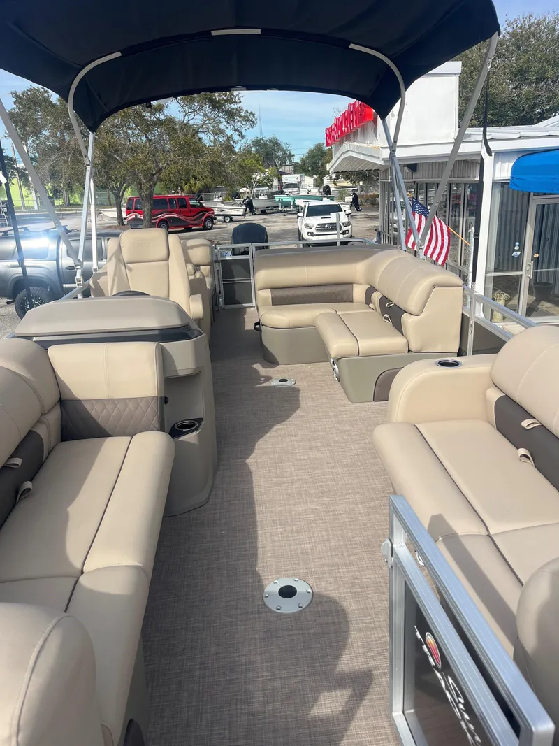 Slide: The Image of 2023 Sun Tracker Party Barge 22 RF DLX pontoon boat with spacious seating and canopy. - 3