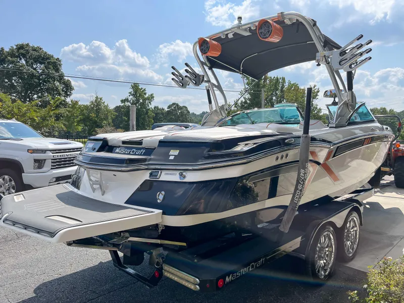 Slide: The Image of 2013 MasterCraft XStar boat on a trailer, ready for transport. - 4