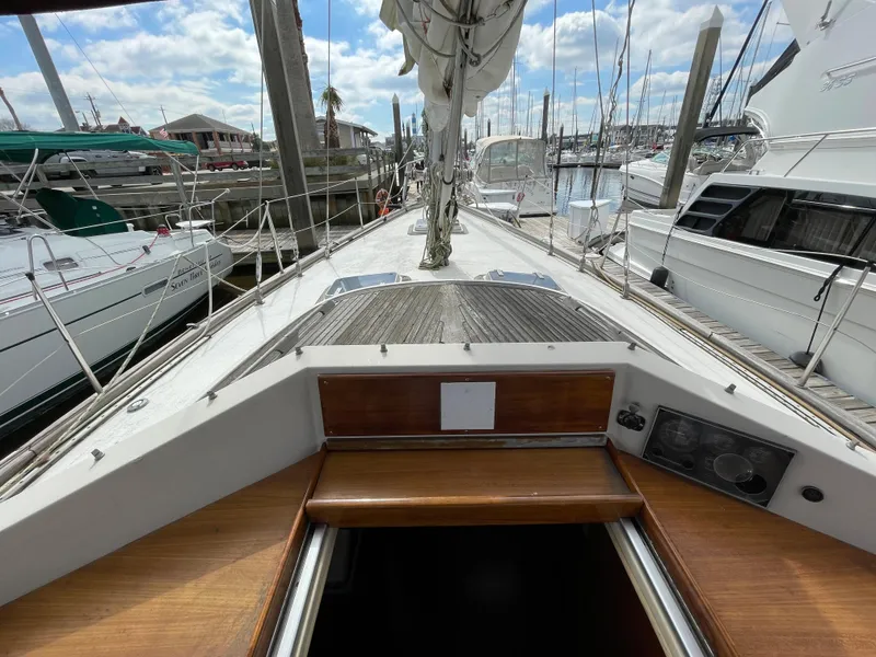 Slide: The Image of 1983 Najad 371 American CC sailboat docked at a marina, view from the cockpit. - 13