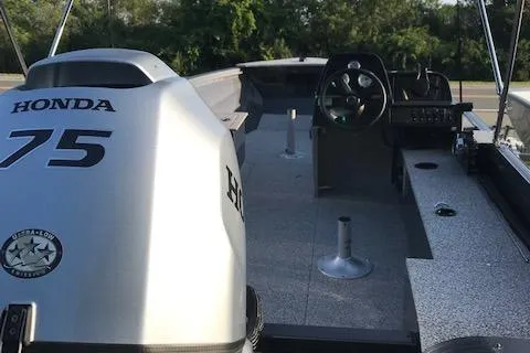 Slide: The Image of 2023 Polar Kraft Outlander 165 SC boat with Honda 75 engine, interior view. - 10