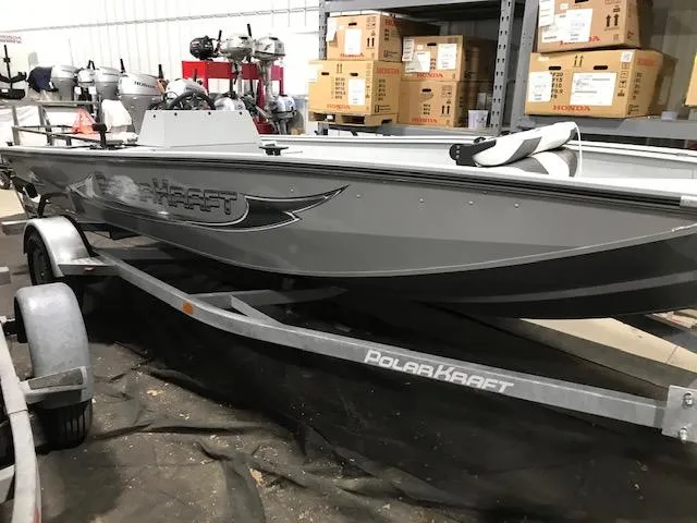 Slide: The Image of 2023 Polar Kraft Sport X boat on trailer in storage facility. - 6