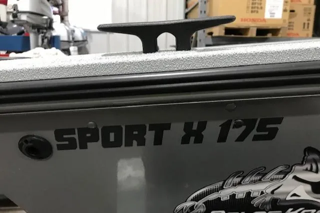 Slide: The Image of 2023 Polar Kraft Sport X 175 boat side view in a workshop. - 9