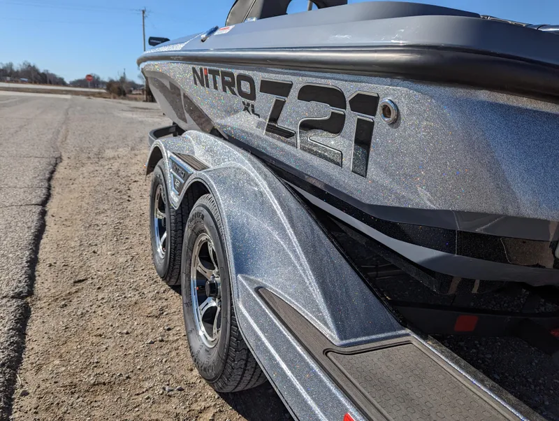 Slide: The Image of 2023 Nitro Z21 XL Pro boat on a trailer, side view. - 3