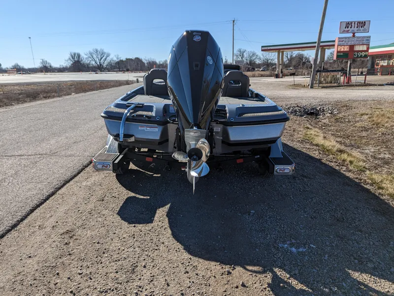 Slide: The Image of 2023 Nitro Z21 XL Pro boat on trailer, rear view, parked on roadside. - 4
