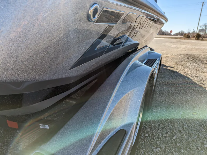 Slide: The Image of 2023 Nitro Z21 XL Pro boat on trailer, close-up side view. - 6