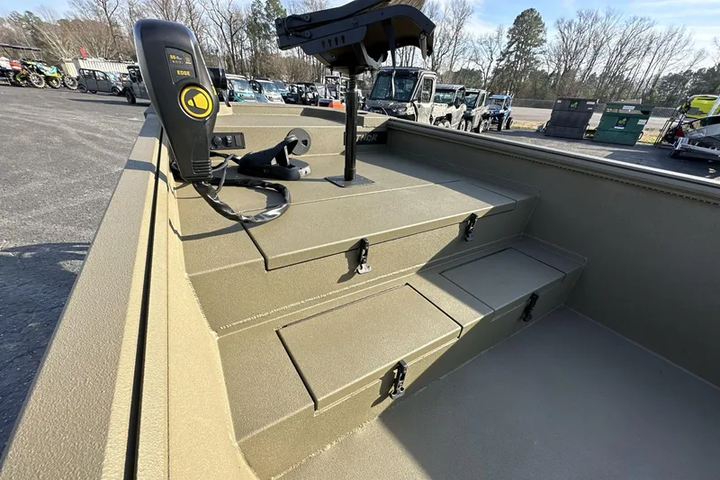 Slide: The Image of 2023 Thor Lake Hammer Elite boat interior with storage compartments and control panel. - 10