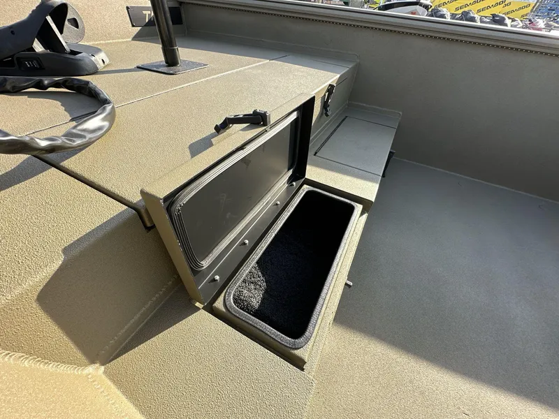 Slide: The Image of 2023 Thor Lake Hammer Elite boat with open storage compartment. - 4