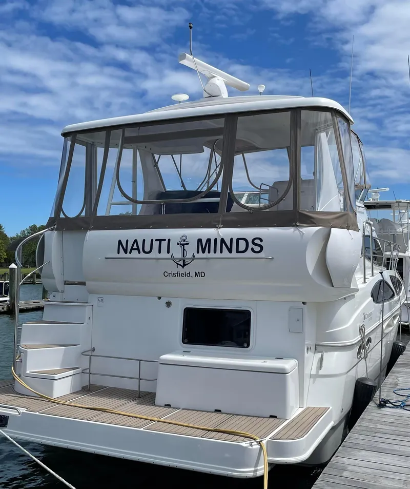 Slide: The Image of 2006 Cruisers Yachts 385 Motoryacht docked, named Nauti Minds, Crisfield, MD. - 2