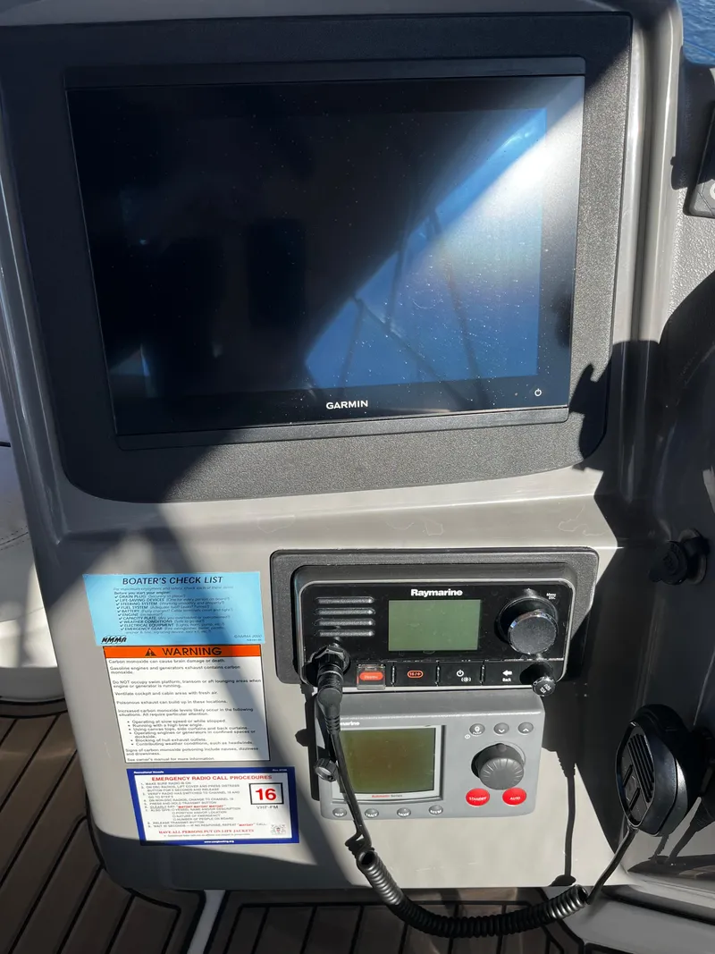 Slide: The Image of Garmin and Raymarine navigation equipment on 2006 Cruisers Yachts 385 Motoryacht. - 22