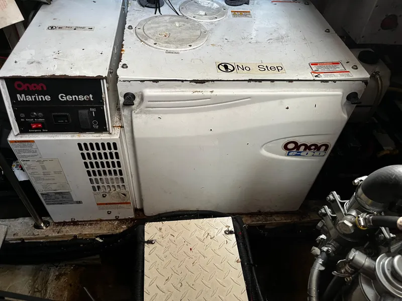 Slide: The Image of Onan Marine Genset in the engine room of a 2006 Cruisers Yachts 385 Motoryacht. - 27