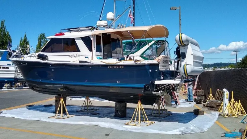 Slide: The Image of 2017 Cutwater C-28 boat in shipyard, blue design. - 16