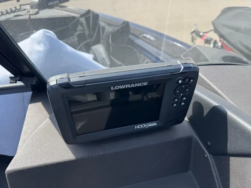 Slide: The Image of Lowrance Hook fish finder on 2023 Tracker Targa V-18 WT boat dashboard. - 11