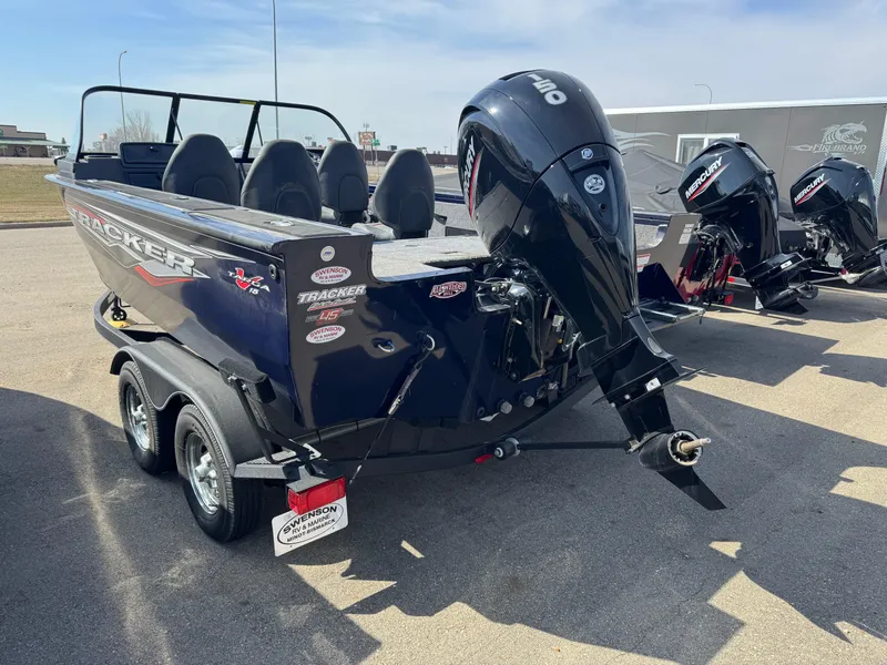 Slide: The Image of 2023 Tracker Targa V-18 WT boat with outboard motor on a trailer. - 4