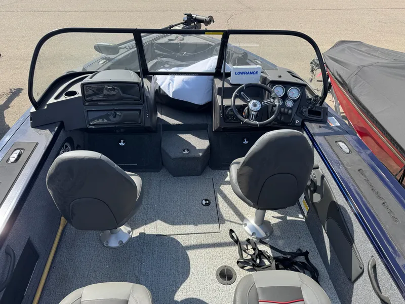 Slide: The Image of 2023 Tracker Targa V-18 WT boat interior with dual seats and steering console. - 7