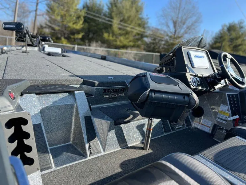 Slide: The Image of 2023 Ranger Z519 Ranger Cup Equipped boat interior with steering console and navigation system. - 11