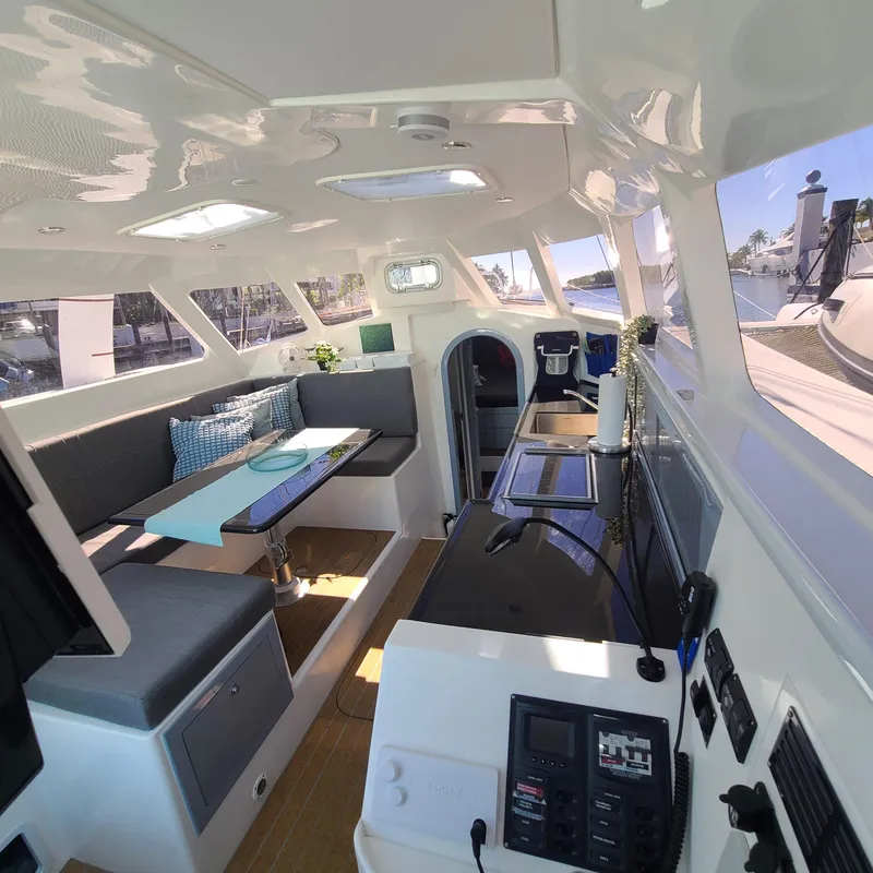 Slide: The Image of Modern interior of 2025 Rapido 40 catamaran with sleek design and spacious seating area. - 10