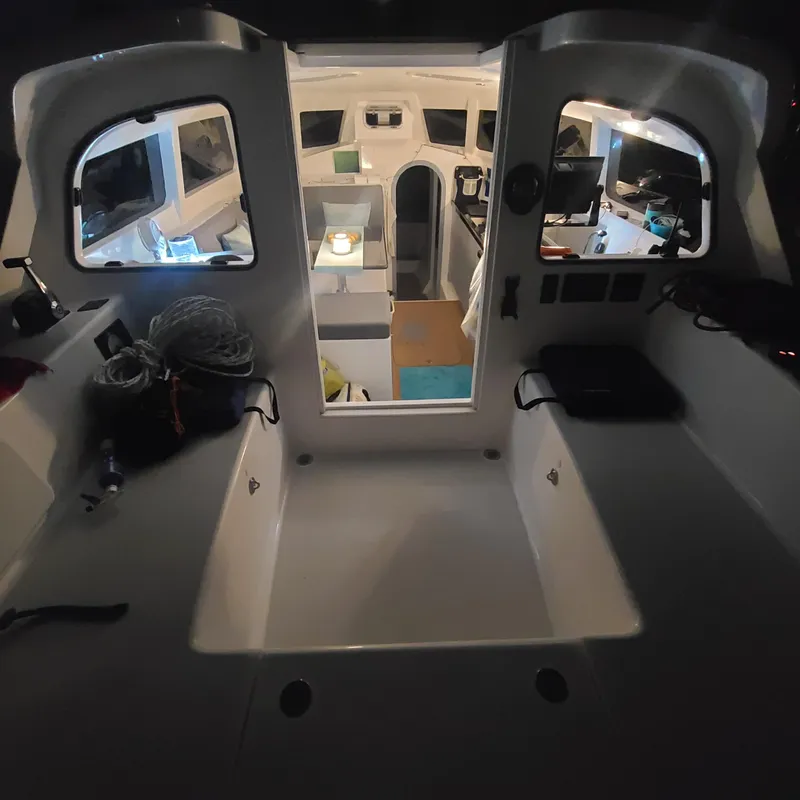 Slide: The Image of Interior view of 2025 Rapido 40 sailboat, showcasing modern cabin design and equipment. - 16