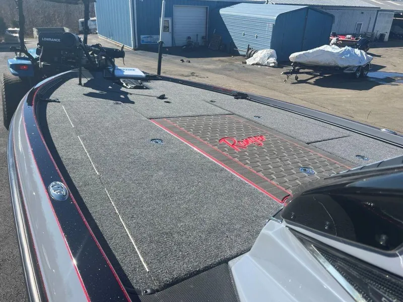 Slide: The Image of 2023 Ranger Z521R Cup Anniversary boat deck with fishing equipment. - 4