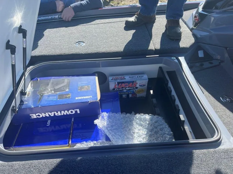 Slide: The Image of 2023 Ranger Z521R Cup Anniversary storage compartment with Lowrance electronics and Lucas Slick Mist. - 7