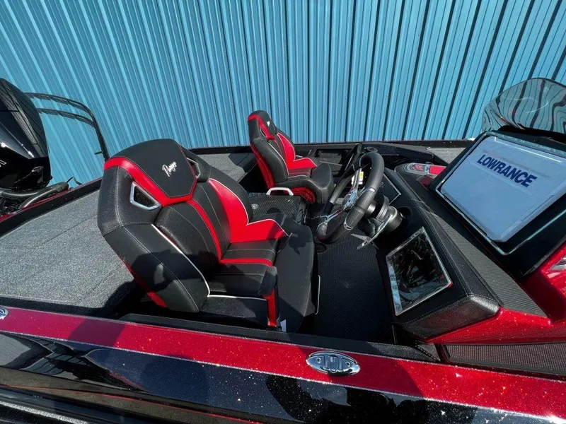 Slide: The Image of 2023 Ranger Z520R Ranger Cup Equipped boat interior with red and black seats. - 15
