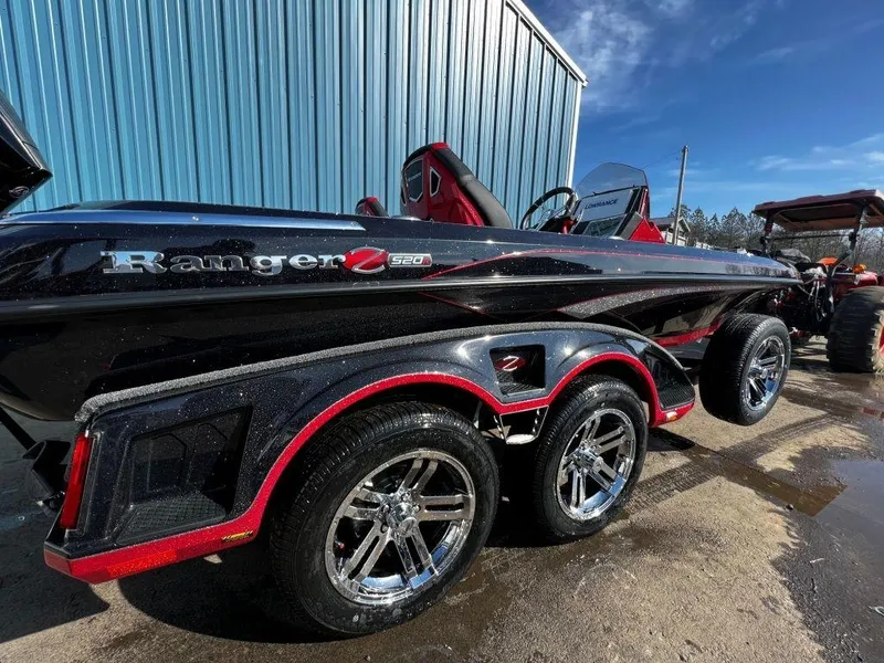 Slide: The Image of 2023 Ranger Z520R Ranger Cup Equipped boat with dual-axle trailer in a parking lot. - 8