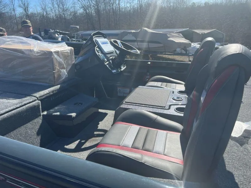 Slide: The Image of 2023 Ranger RT198P boat interior with dual seats and steering console. - 3