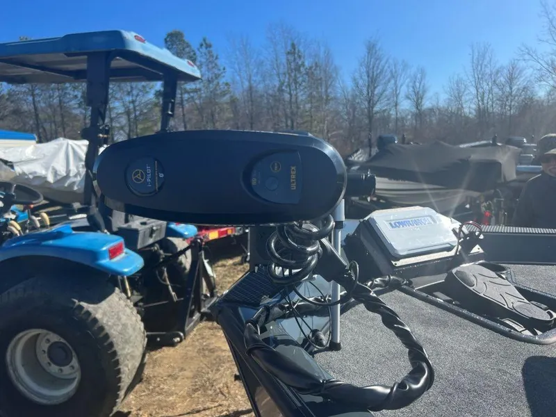 Slide: The Image of 2023 Ranger RT198P boat with motor and equipment in outdoor setting. - 6