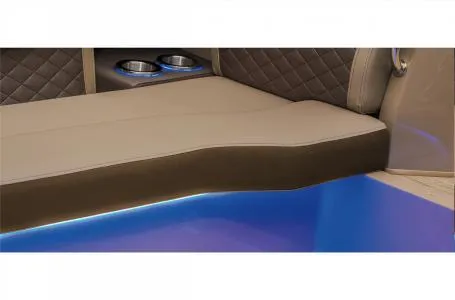 Slide: The Image of 2023 Bennington 23 LXSB boat interior with cushioned seating and LED lighting. - 7