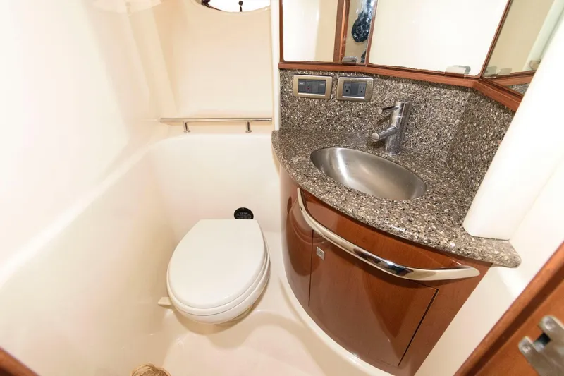 Slide: The Image of Luxurious bathroom in 2008 Sea Ray 44 Sundancer yacht with granite countertop and modern fixtures. - 20