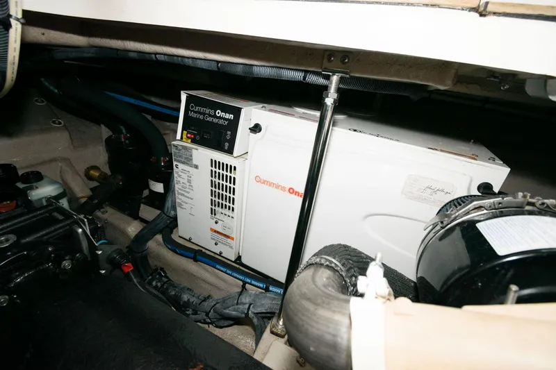 Slide: The Image of Engine room of 2008 Sea Ray 44 Sundancer with Cummins Onan marine generator. - 28