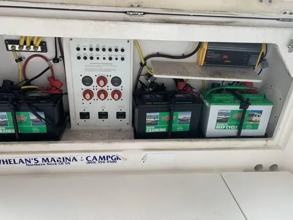 Slide: The Image of 2016 Robalo R300 Center Console battery compartment with cranking and deep cycle batteries. - 12