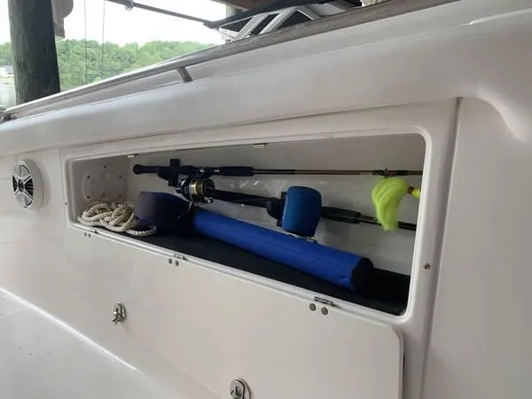 Slide: The Image of Robalo R300 Center Console 2016 boat storage with fishing gear and accessories. - 19