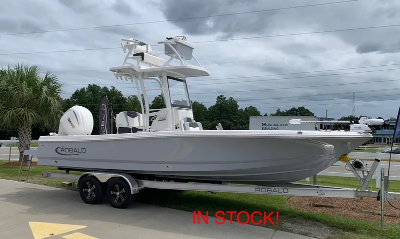 The Image of 2024 Robalo 246 Cayman SD boat on trailer, in stock. - 0
