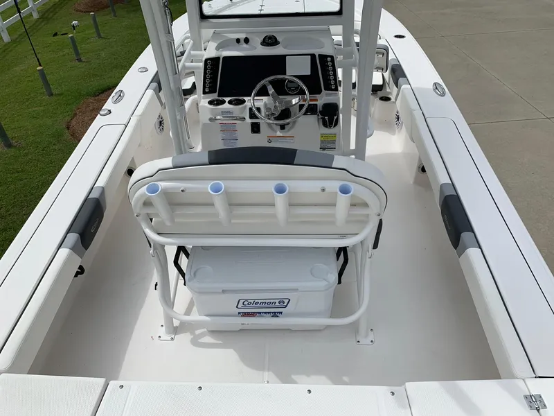 Slide: The Image of 2024 Robalo 246 Cayman SD center console boat interior with helm and seating. - 16