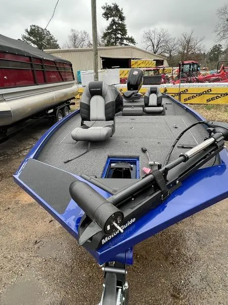 Slide: The Image of 2023 Crestliner XFC 189 fishing boat with trolling motor and seating. - 2