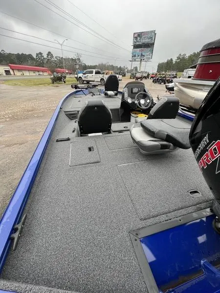 Slide: The Image of 2023 Crestliner XFC 189 fishing boat with spacious deck and seating. - 5