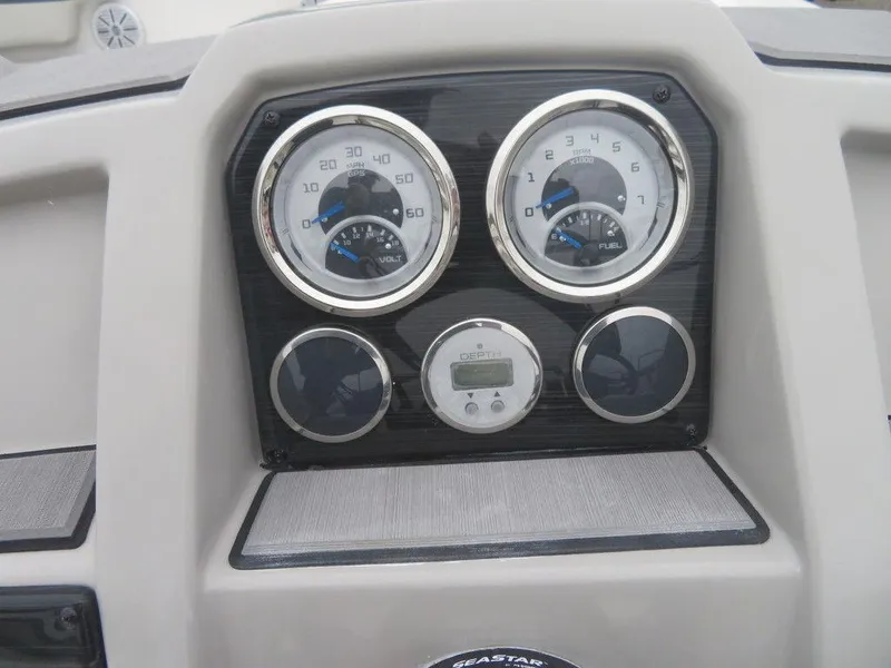 Slide: The Image of Dashboard of 2023 Starcraft SVX 211 OB boat with gauges and digital display. - 13