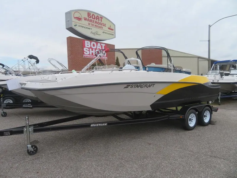 Slide: The Image of 2023 Starcraft SVX 211 OB boat on trailer at dealership. - 4