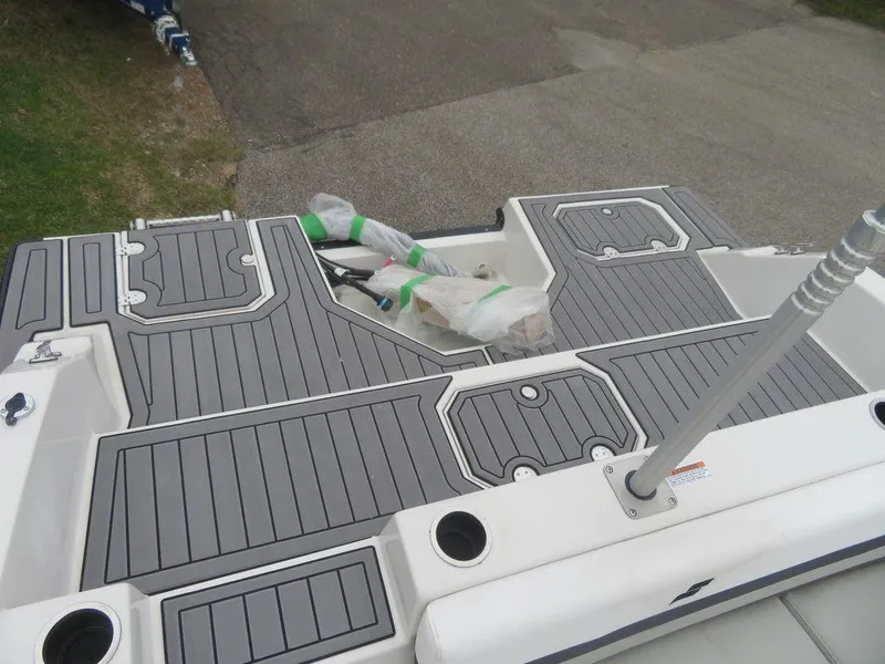 Slide: The Image of 2023 Starcraft SVX 211 OB boat deck with gray non-slip flooring. - 5