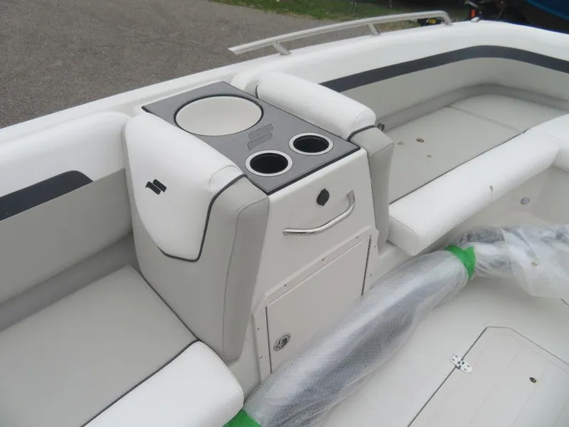 Slide: The Image of 2023 Starcraft SVX 211 OB boat interior with cup holders and seating. - 6