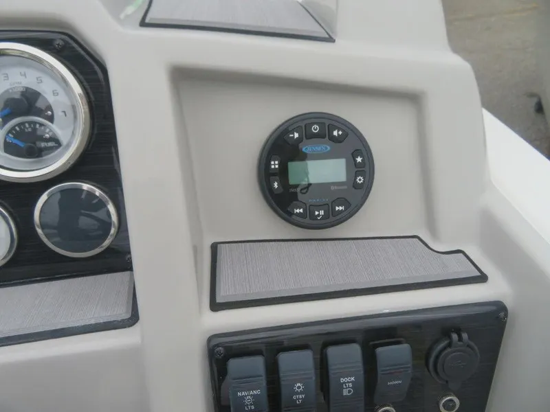 Slide: The Image of 2023 Starcraft SVX 211 OB boat dashboard with gauges and control panel. - 9
