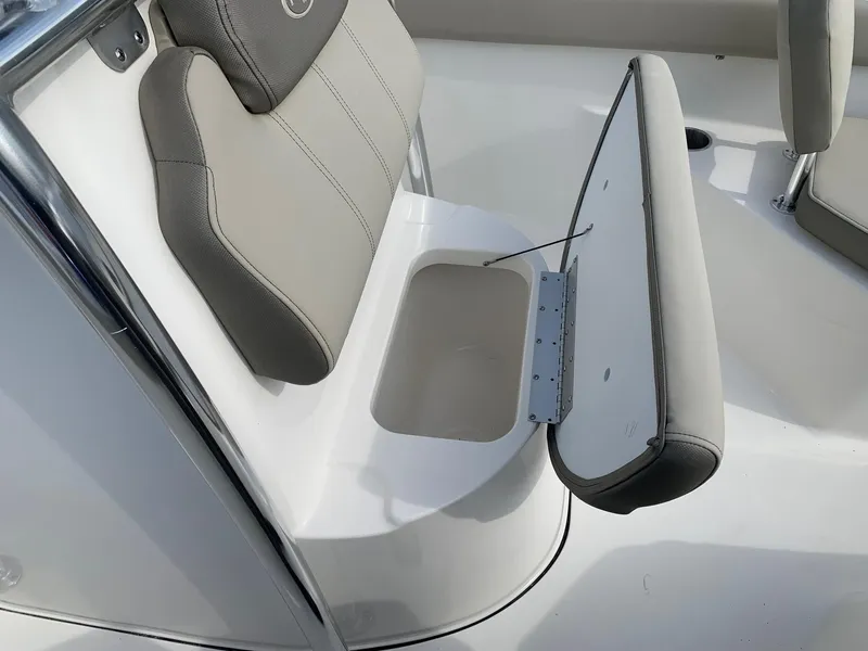 Slide: The Image of 2024 Key West 203 FS boat seat with storage compartment. - 10